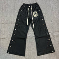 Pantalones 'Side-Snap Track' - Edición Streetwear Vanguardista