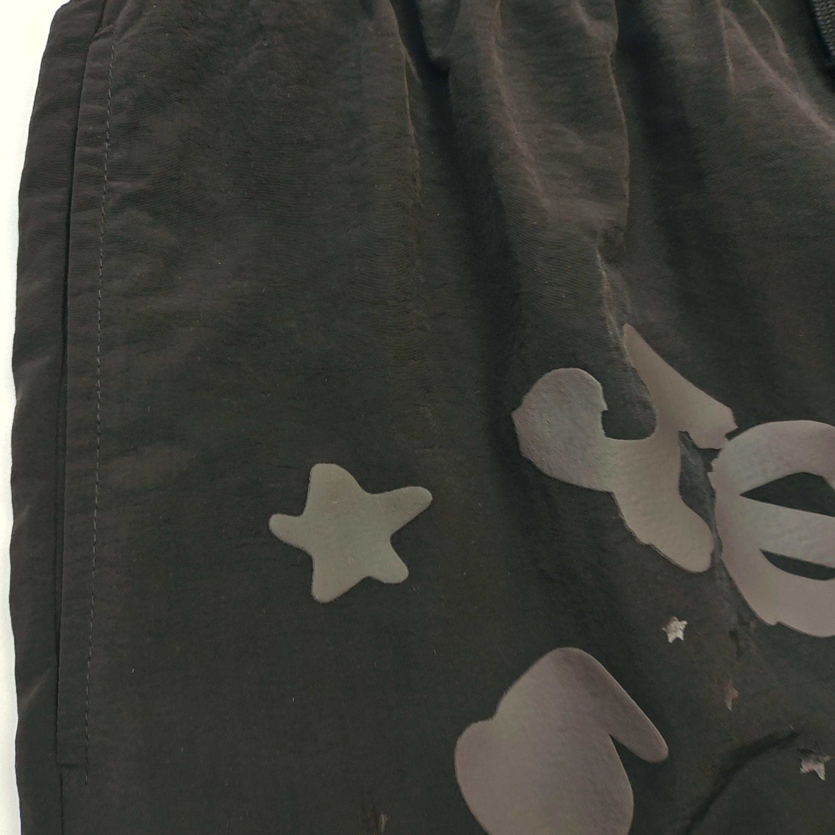 Shorts Sp5der – Doble Capa con Logo y Estrellas
