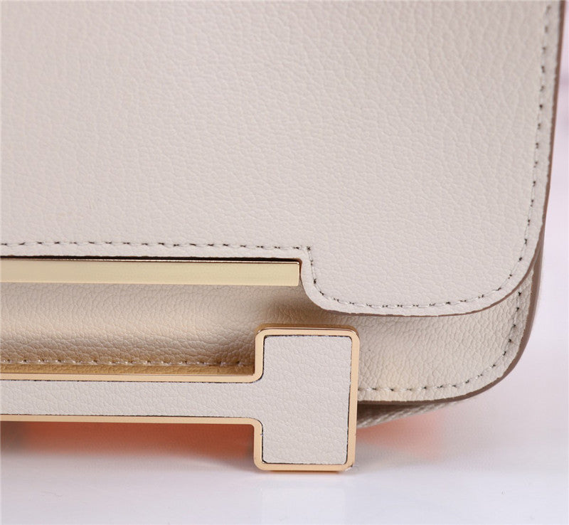 Bolso bandolera diseño elegante con cierre geométrico / Bolso cruzado de lujo accesible