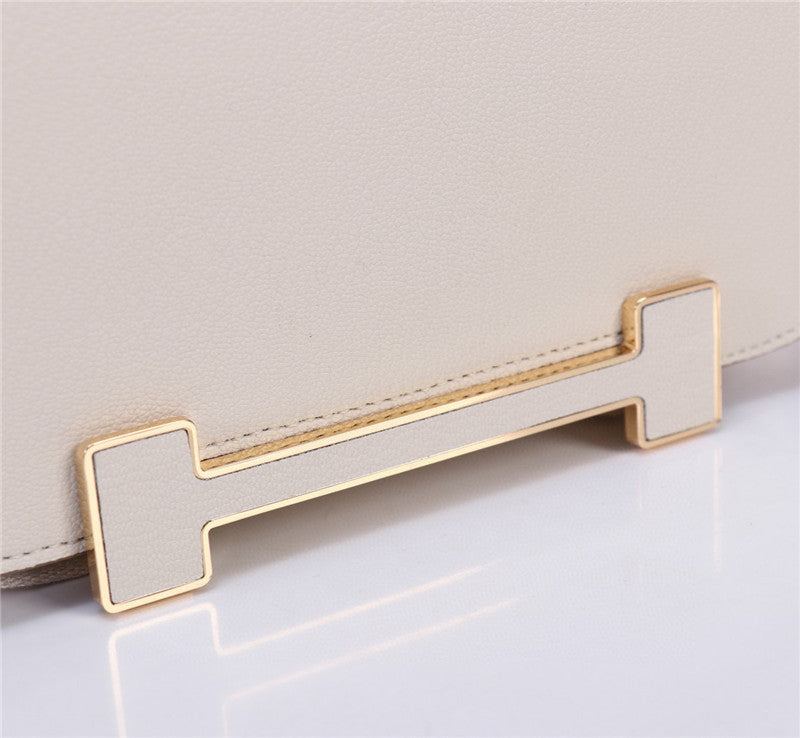 Bolso bandolera diseño elegante con cierre geométrico / Bolso cruzado de lujo accesible
