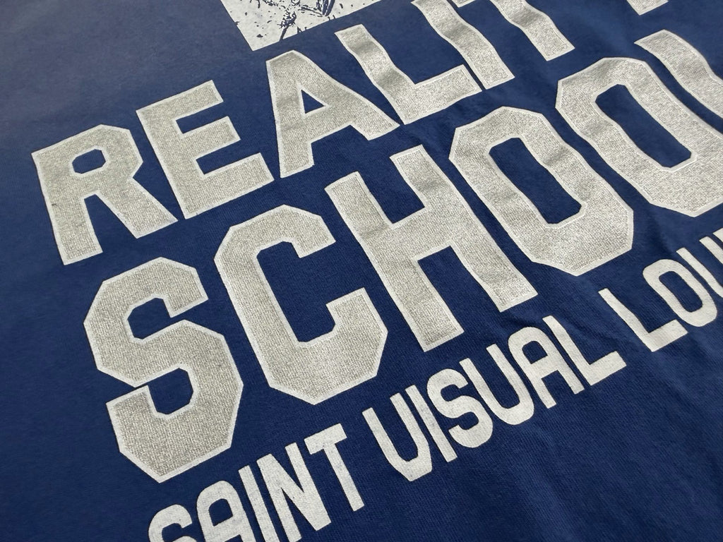 Camiseta gráfica azul desgastada / Camiseta estilo vintage con impresión "Reality School"