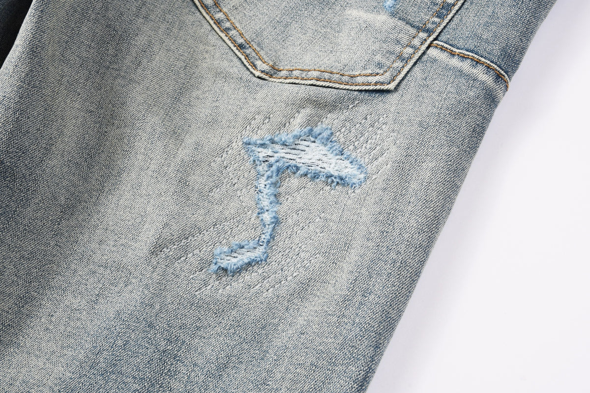 Jeans Purple Brand – Lavado Vintage con Parches Azules