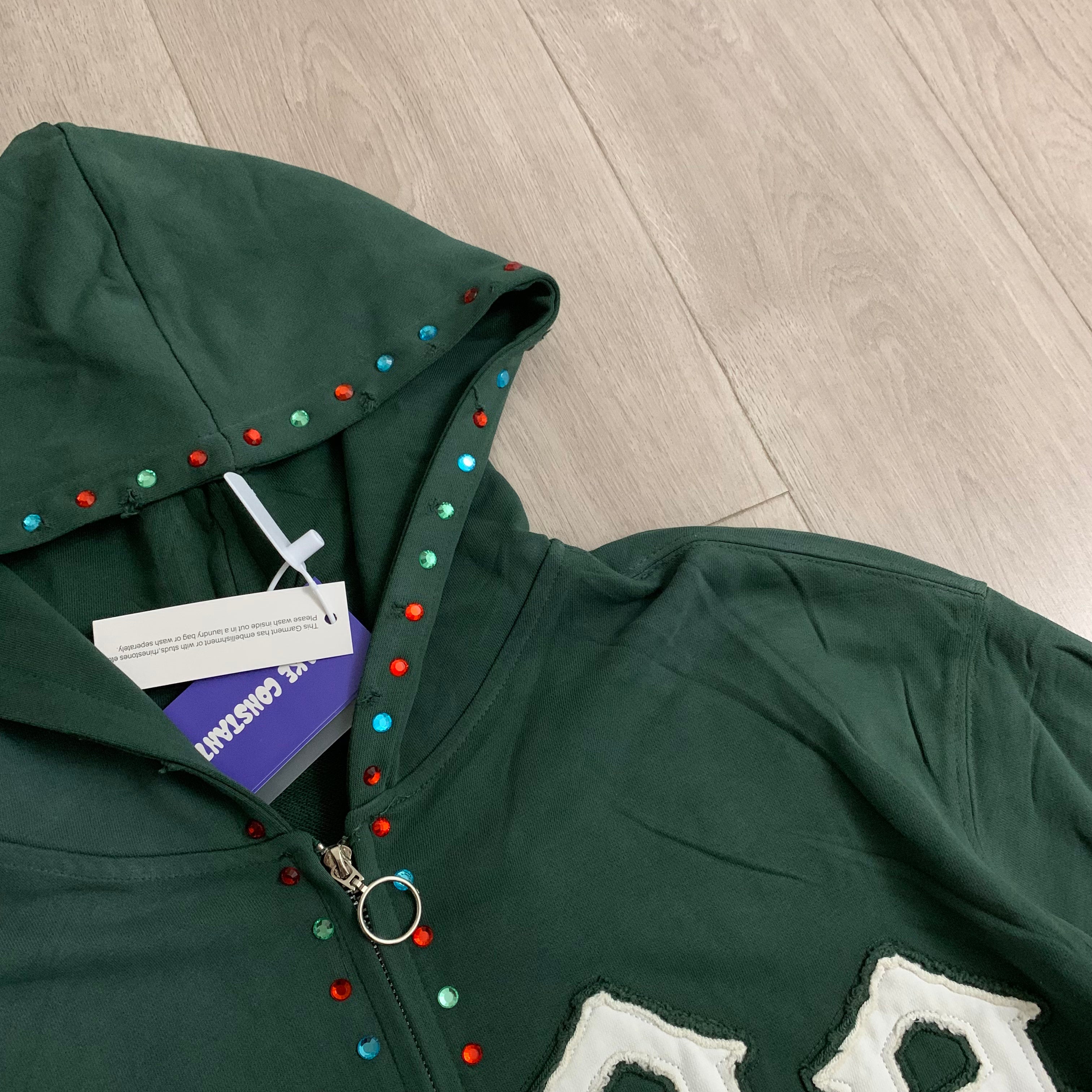Sudaderas con capucha y cierre completo "DUAA 33" con detalles de tachuelas