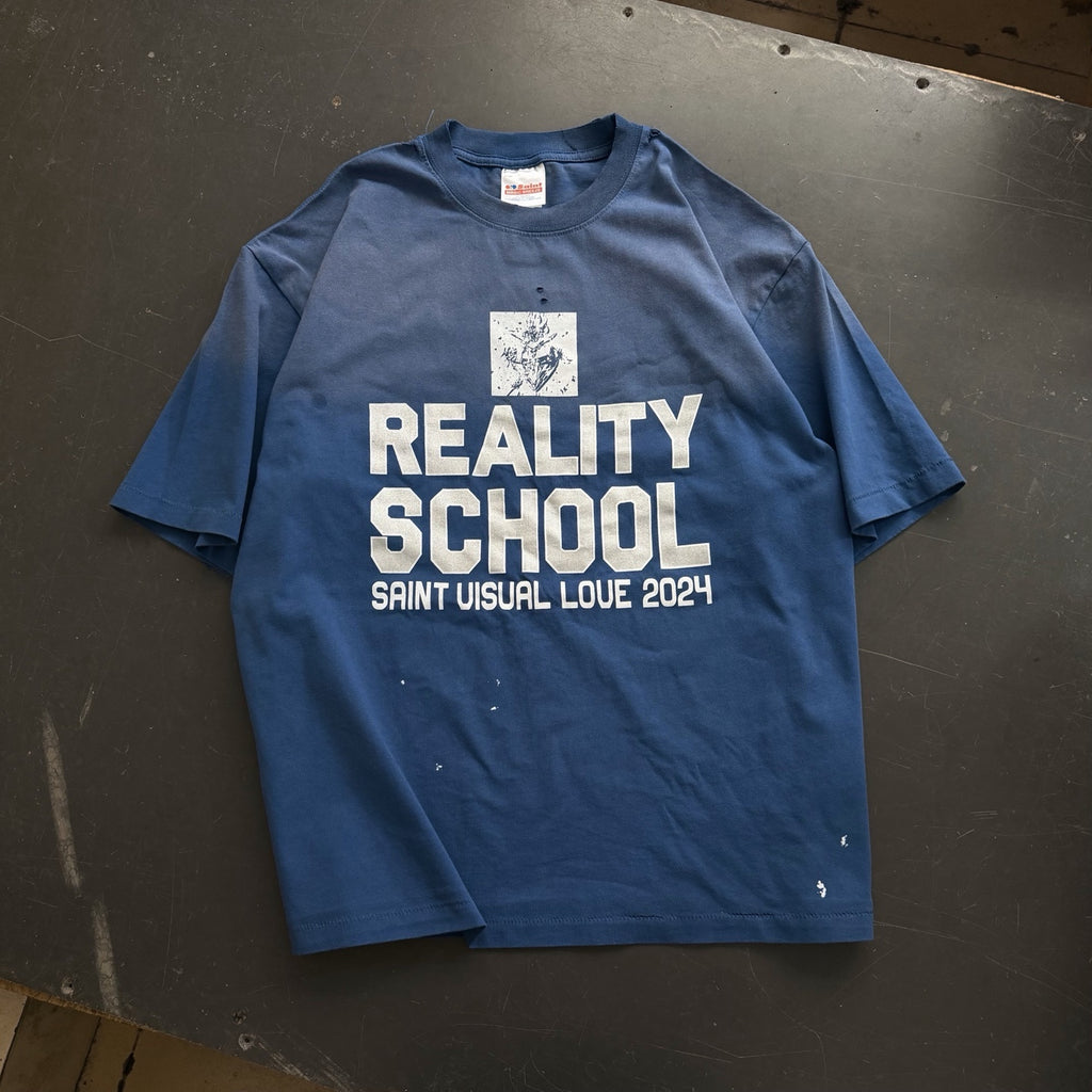 Camiseta gráfica azul desgastada / Camiseta estilo vintage con impresión "Reality School"