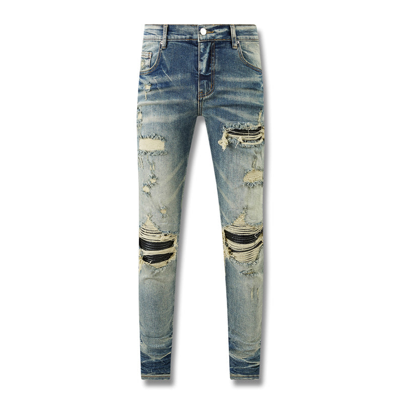 Jeans Azul Lavado con Roturas y Parches de Contraste