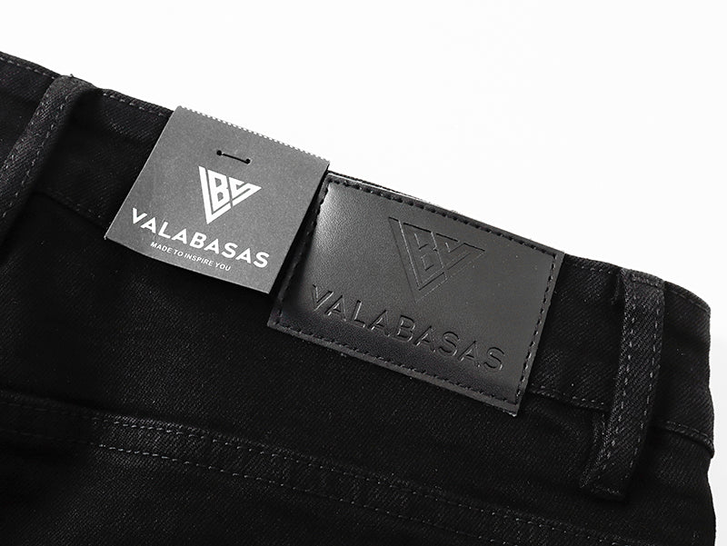 Jeans Valabasas – Negro Lavado con Remiendos