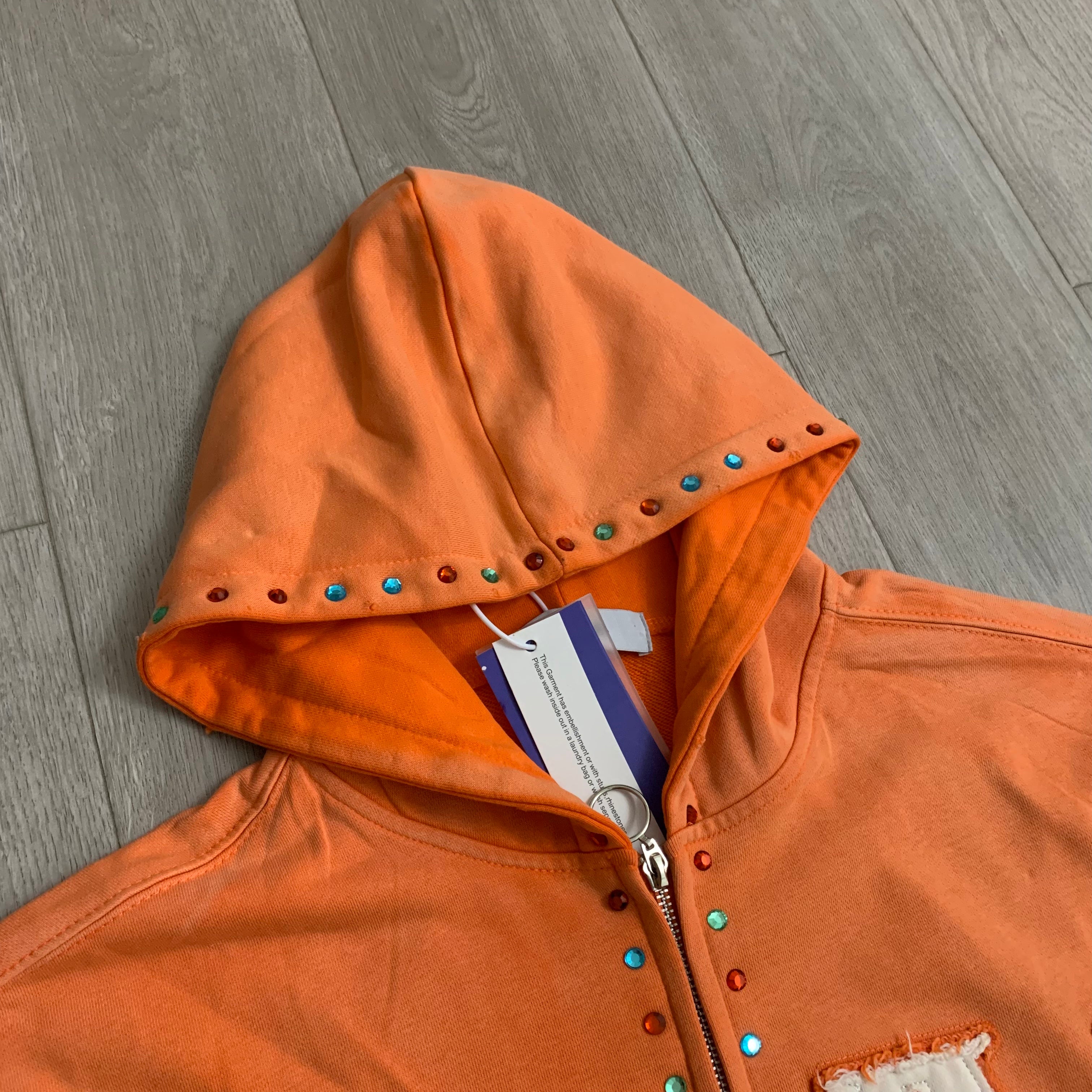Sudaderas con capucha y cierre completo "DUAA 33" con detalles de tachuelas