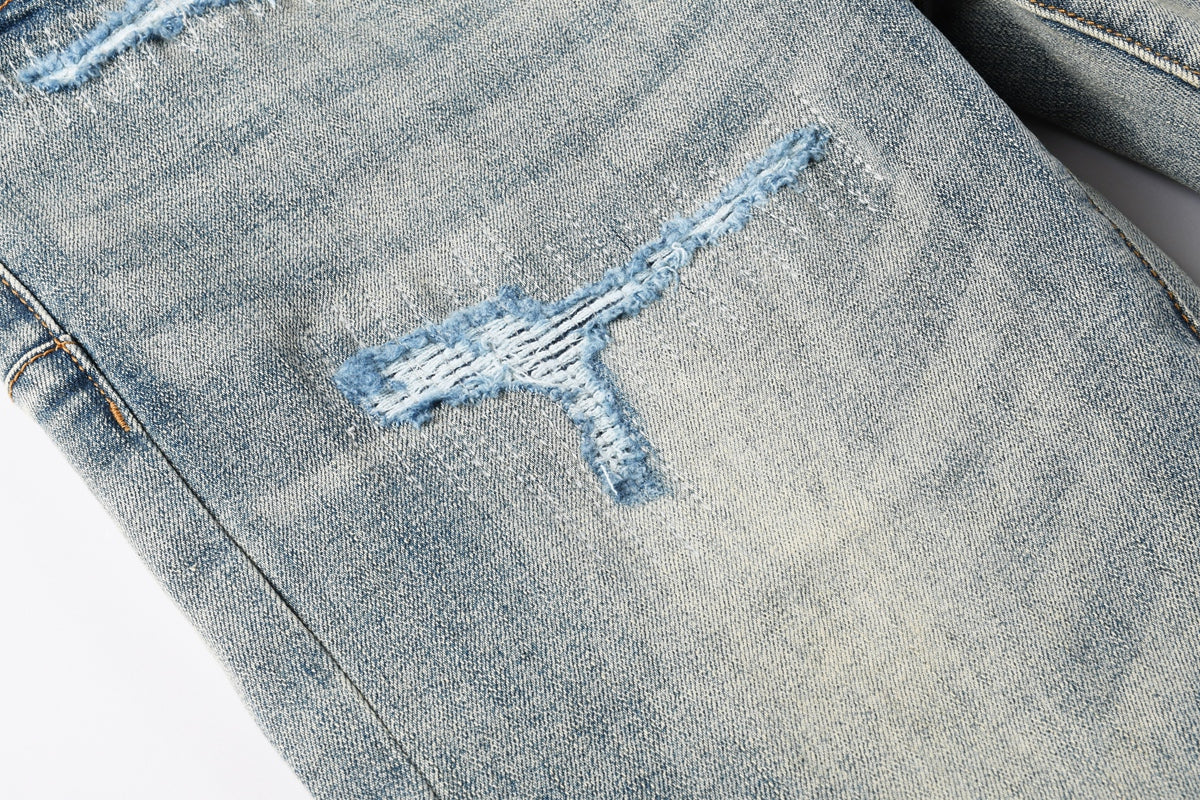 Jeans Purple Brand – Lavado Vintage con Parches Azules