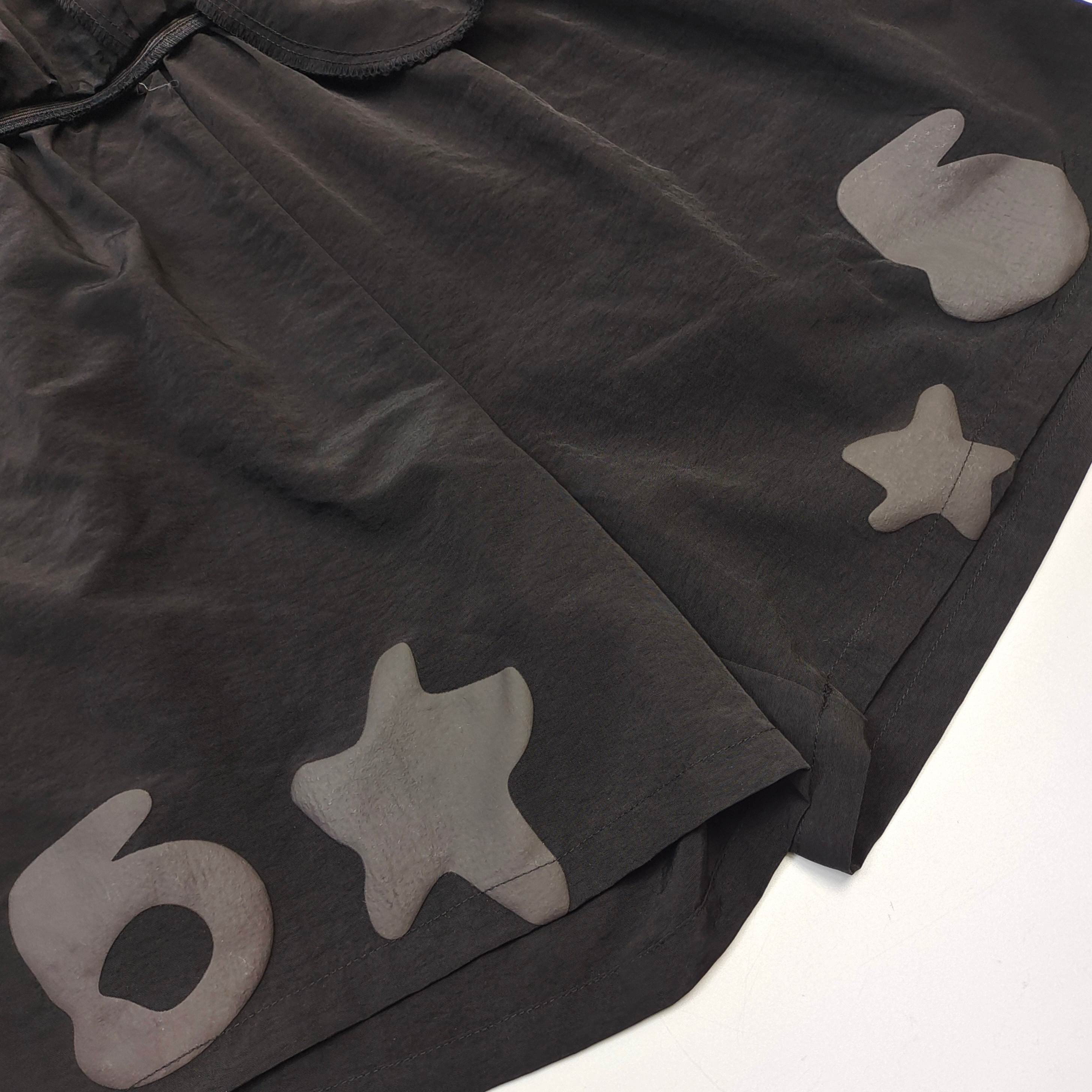 Shorts Sp5der – Doble Capa con Logo y Estrellas