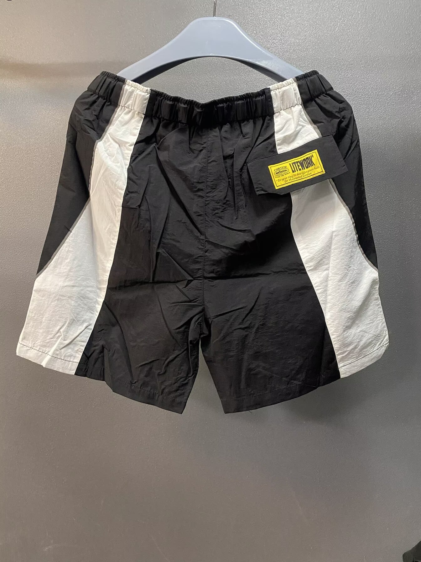 Short Deportivo Wind Panel Blanco/Negro