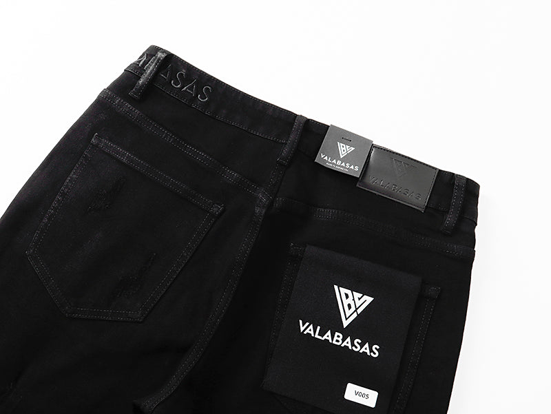Jeans Valabasas – Negro Lavado con Remiendos