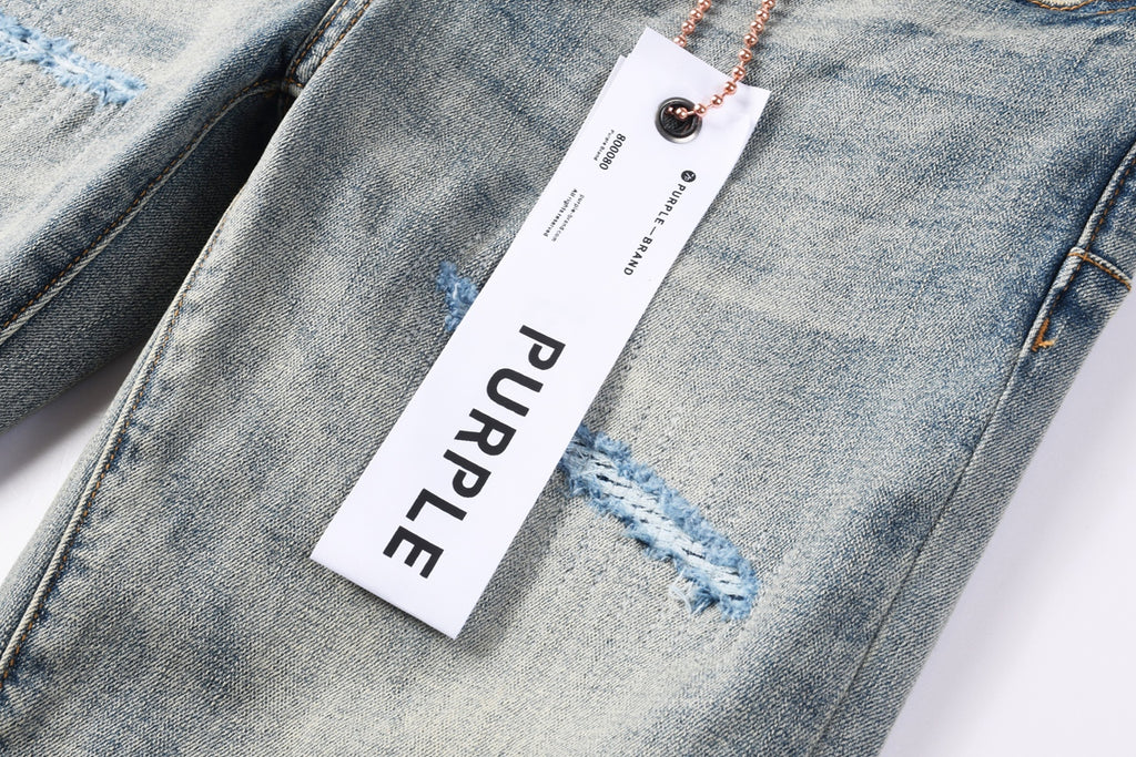 Jeans Purple Brand – Lavado Vintage con Parches Azules