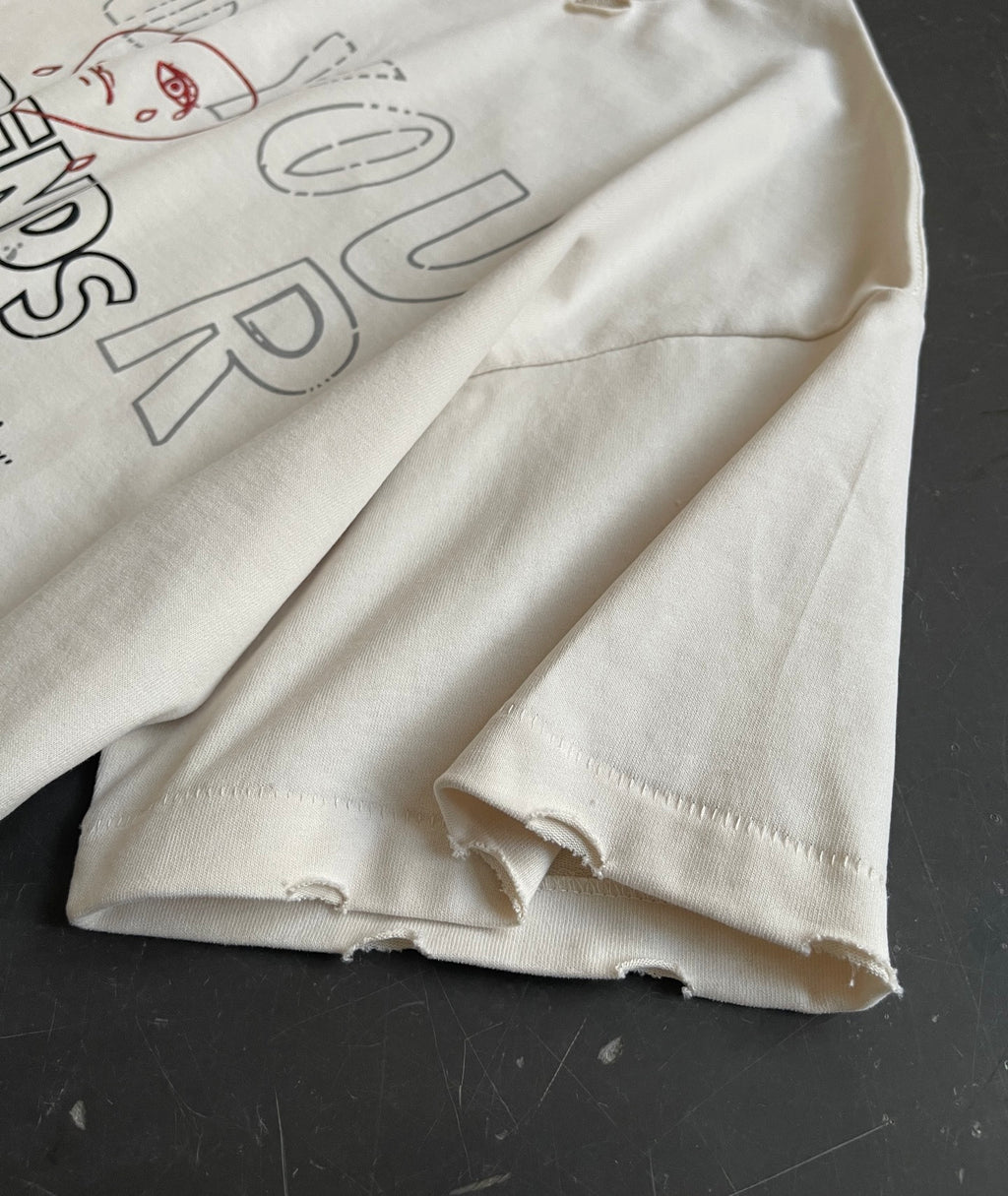 Camiseta gráfica crema con desgastes / Camiseta estilo retro con frases y dibujos
