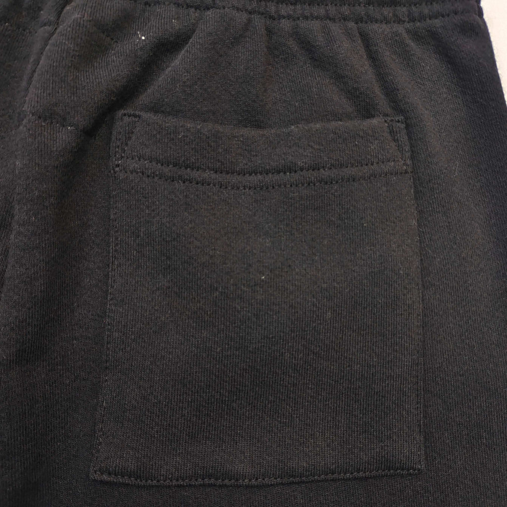 Pantalones Sp5der – Logo Curvo Gris