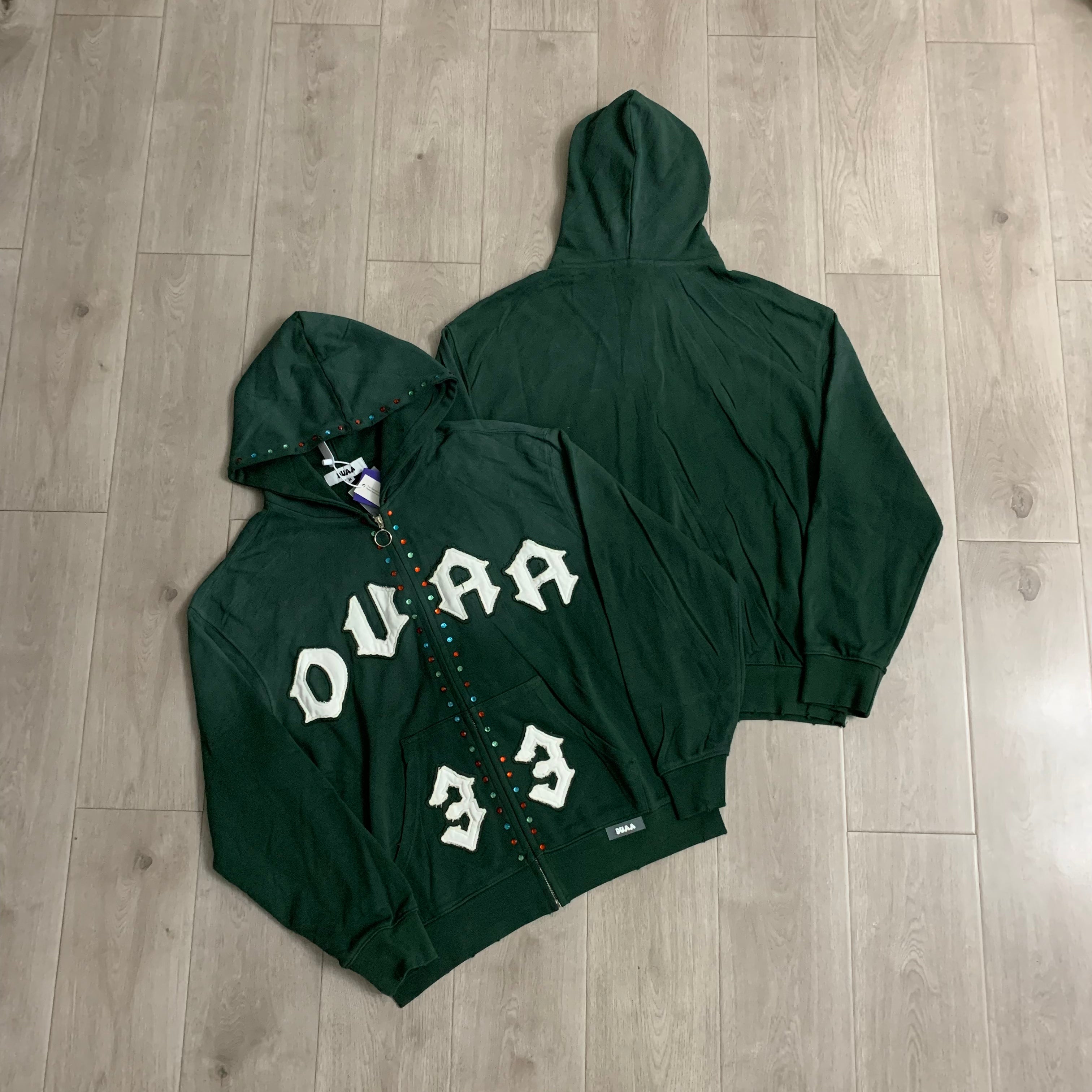Sudaderas con capucha y cierre completo "DUAA 33" con detalles de tachuelas