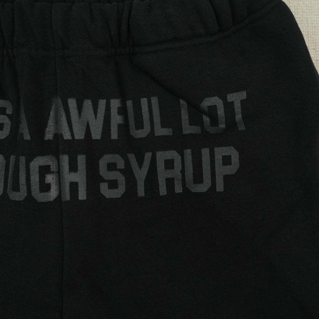 Pantalón Deportivo Negro con Texto – Estilo Urbano