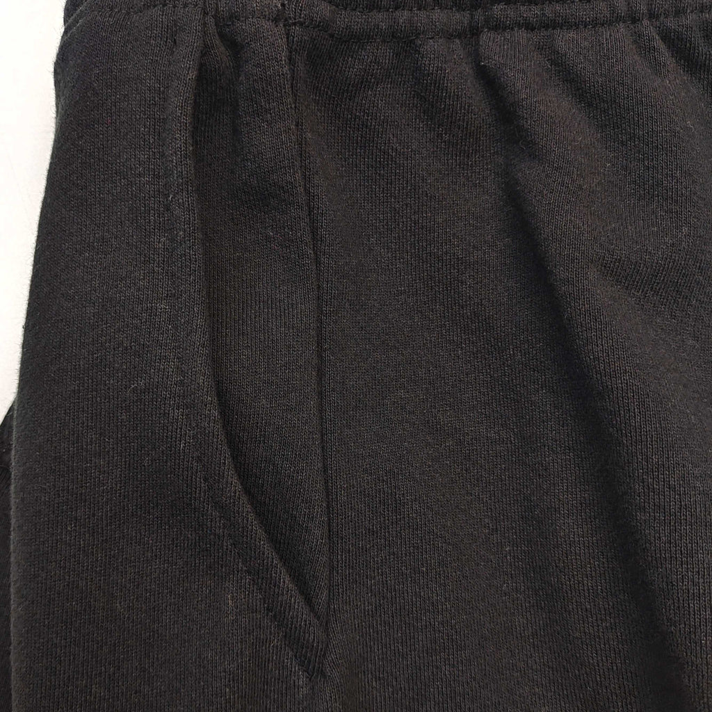 Pantalones Sp5der – Logo Curvo Gris